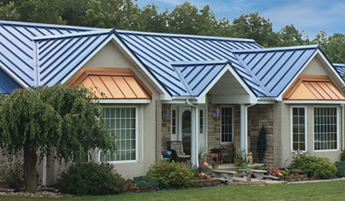 A shot of a blue standing seam metal roof on a home.