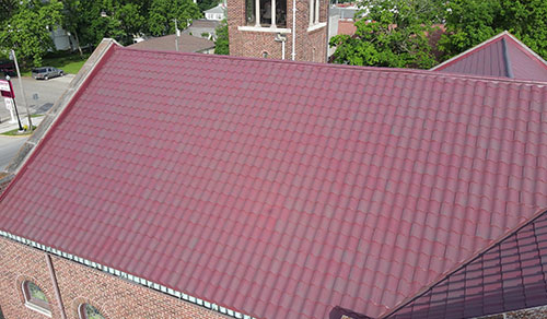 Metal tile panels on church